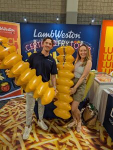 Cameron Irvine and Cassandra Hum of Tibersoft at the Lamb Weston Certified Fry Cook booth at SNA ANC 2026