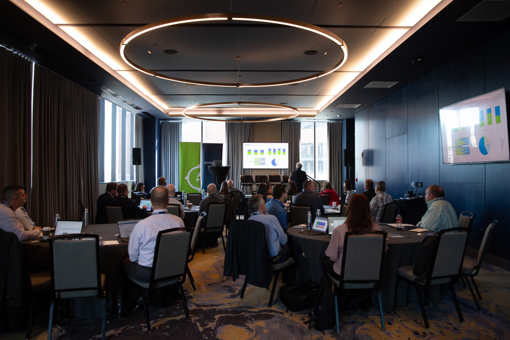 Foodservice manufacturers at round tables during a Tibersoft session at the Navigators conference